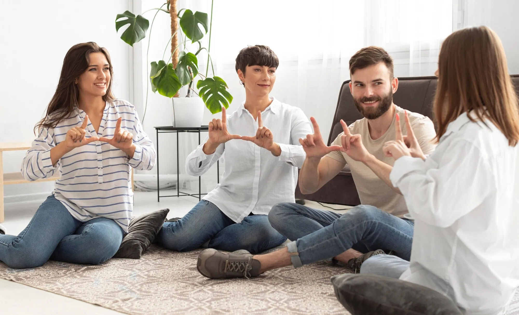 imgi_10_group-deaf-people-communicating-through-sign-language_23-2148719672